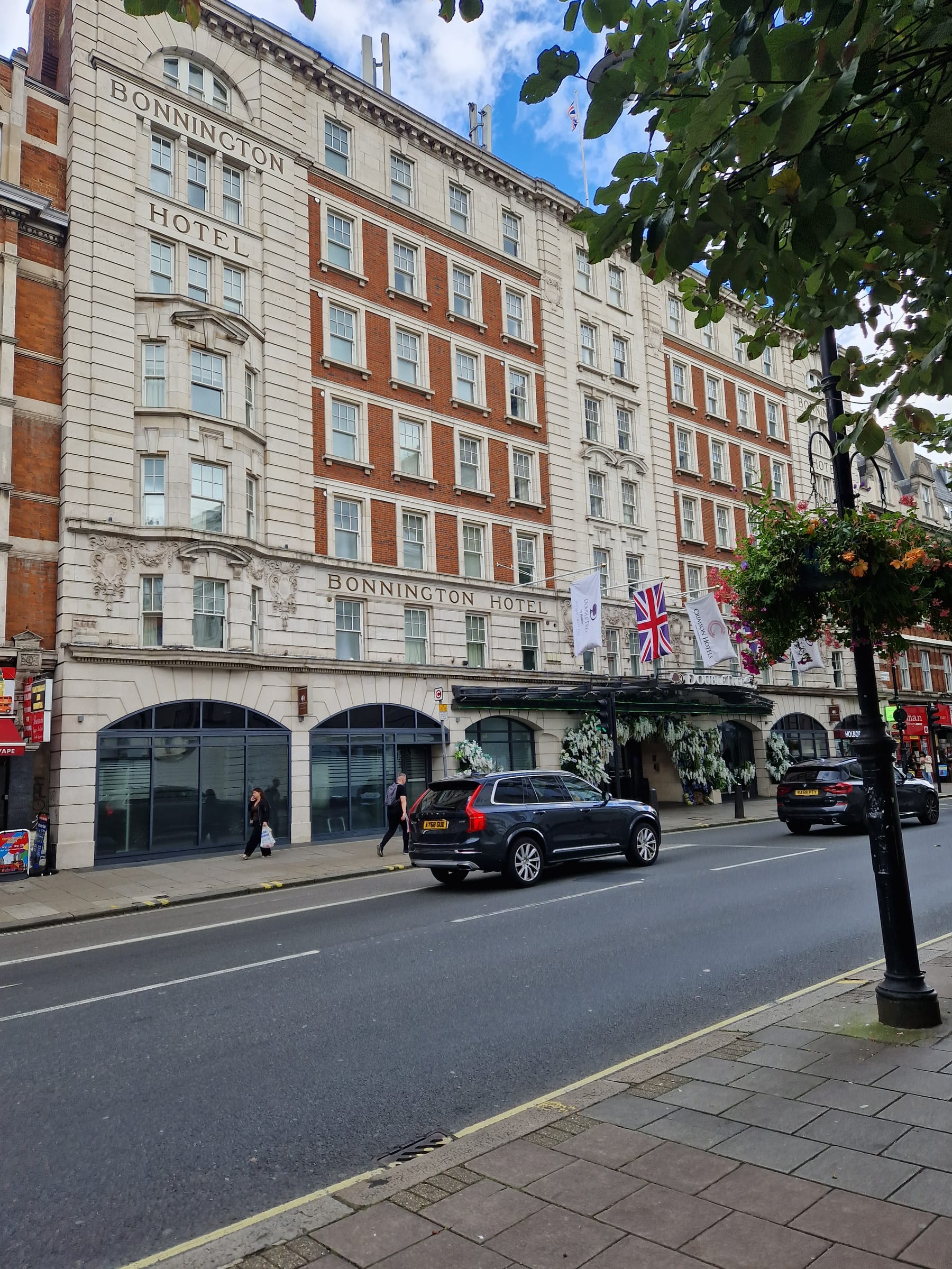 The DoubleTree by Hilton London – West End on Southampton Row, Holborn: the red-brick and stone frontage, seen from the street.