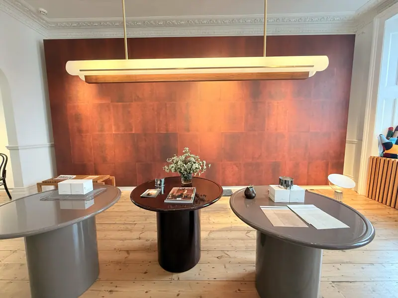 Cadence Oxblood behind BEVERLY 1975's tables during Brompton Design District.