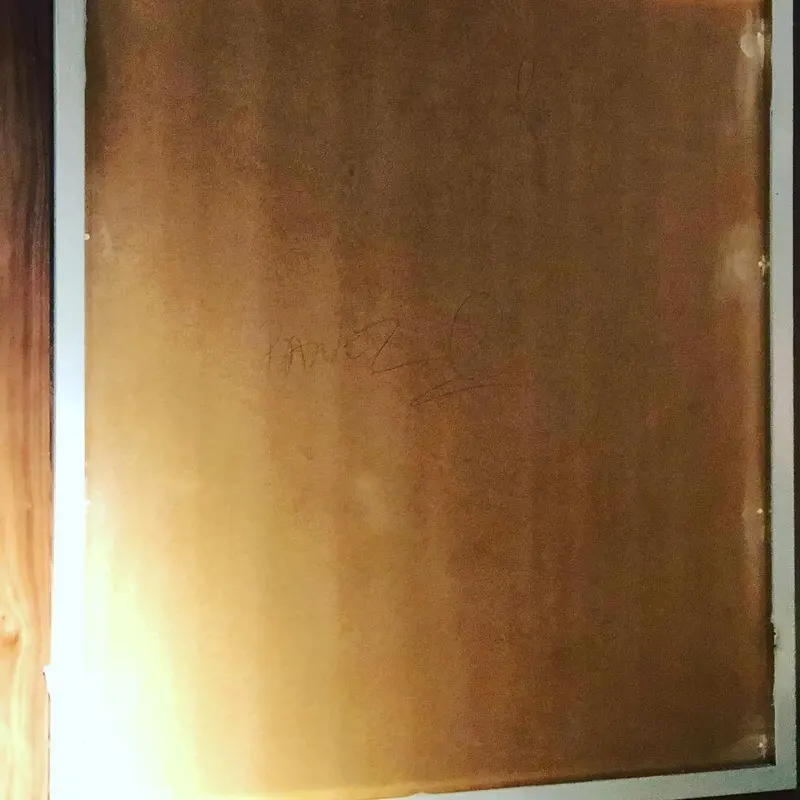 Timber-look wall panel next to the mural area at the Everyman cinema, Liverpool.