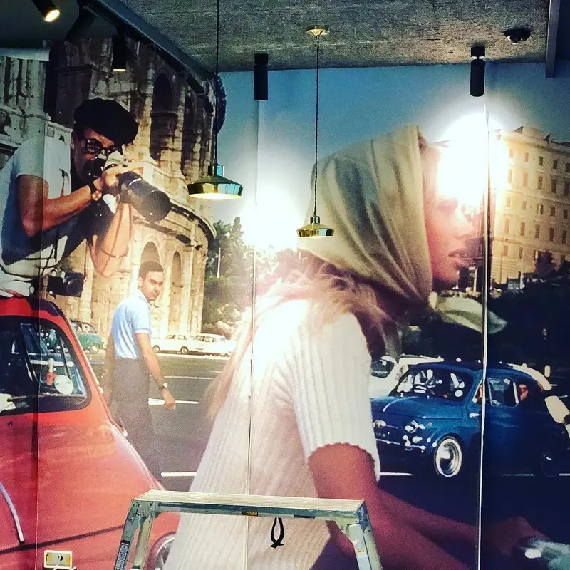 Street-scene digital mural being installed behind the bar seating, Everyman cinema, Liverpool.