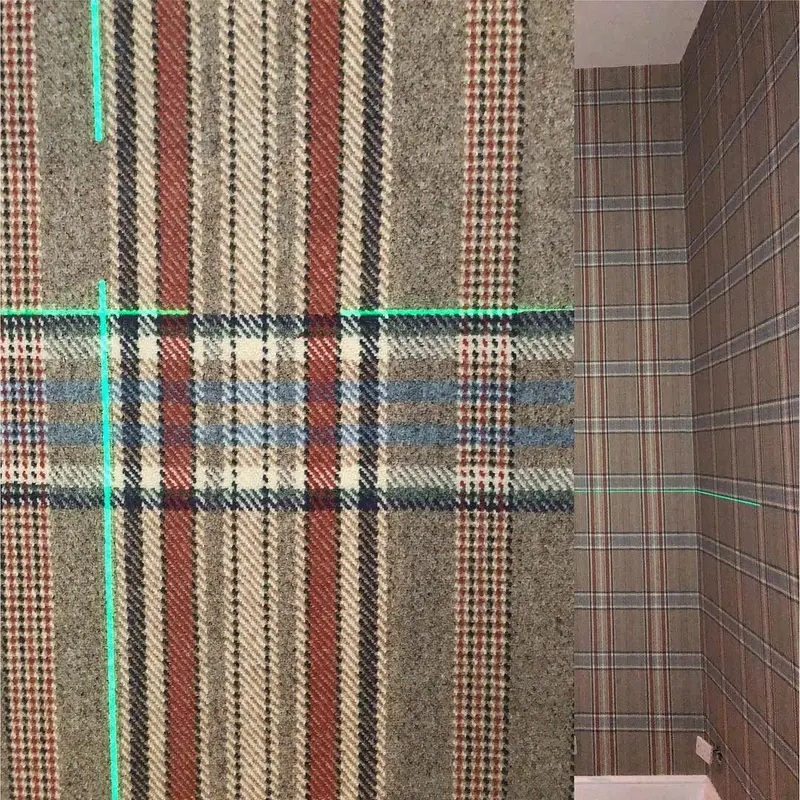 Close-up of the bespoke Huntsman tweed-print wallpaper, Huntsman, Savile Row.