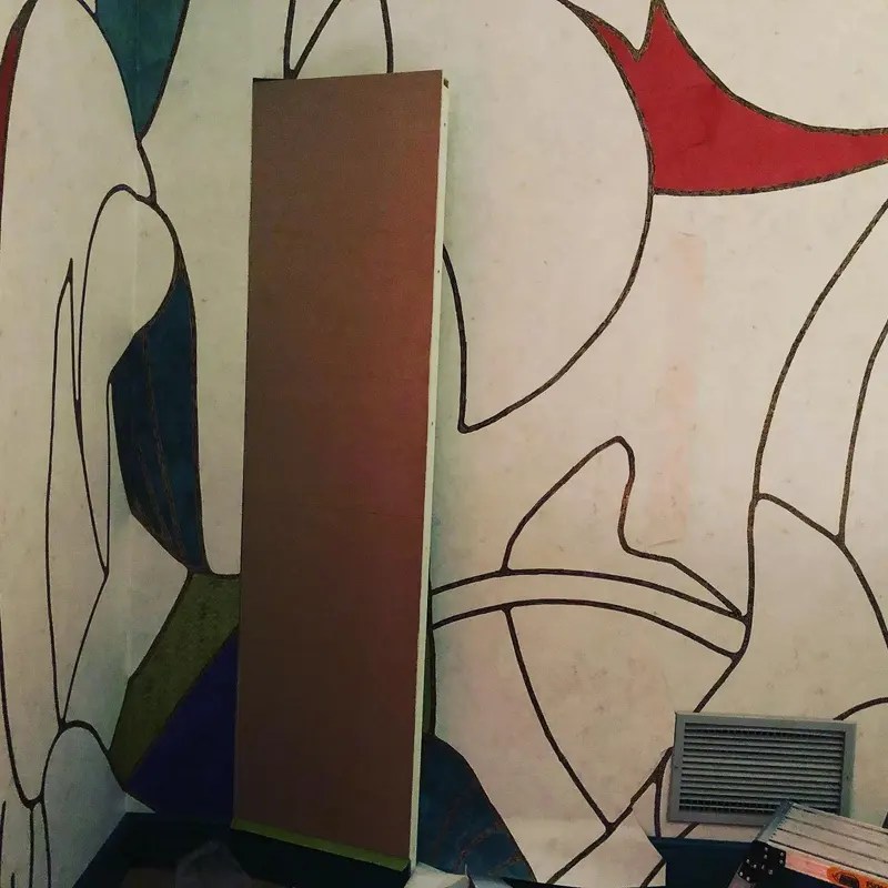 Bold abstract hand-crafted wallcovering on a stand at Masterpiece London 2019.