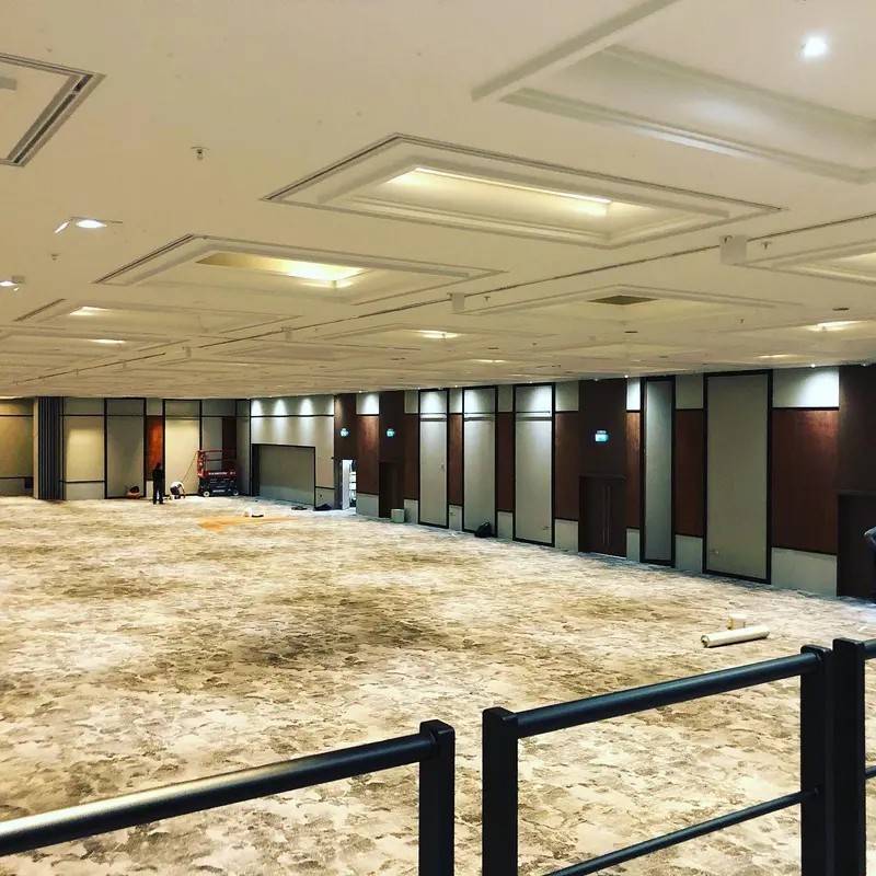 Large conference room at the Hilton London Metropole with Vescom-covered wall panels.