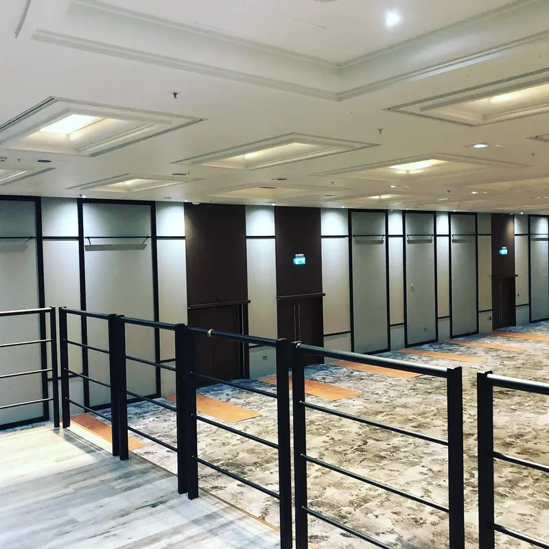 Conference room with balcony rail and wallcovered panels, Hilton London Metropole.