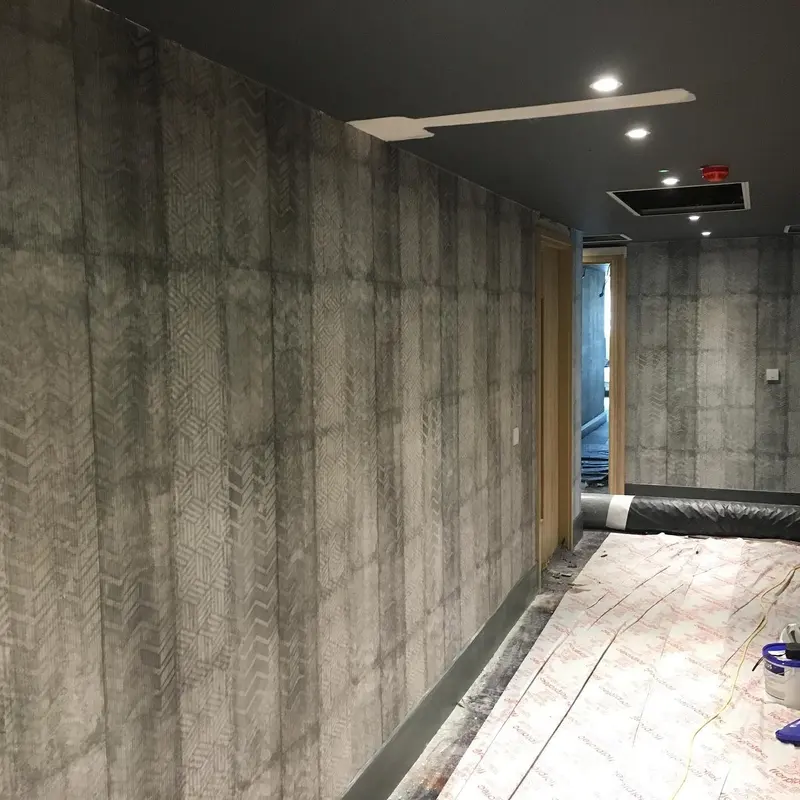 Hotel corridor with concrete-effect wallcovering, Novotel London Canary Wharf.