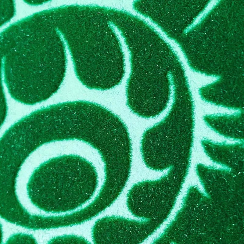 Macro close-up of green-on-white flock pattern, Pendley Manor Hotel, Tring.