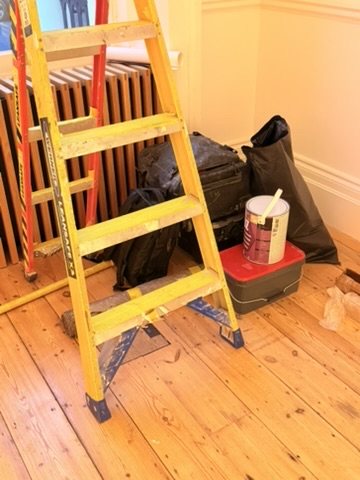 Preparing the wall at The Lavery, Cromwell Place, before hanging.