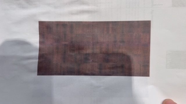 Close-up of the layered texture of Cadence in Oxblood.