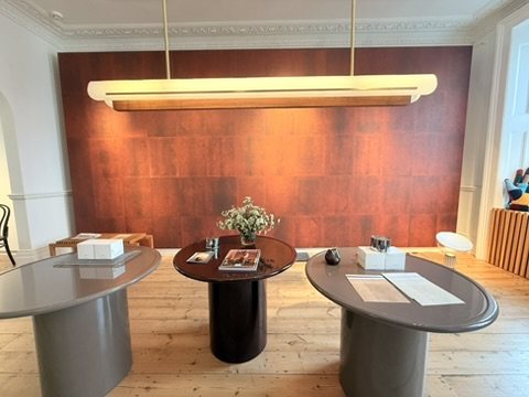 Cadence Oxblood behind BEVERLY 1975's tables during Brompton Design District.