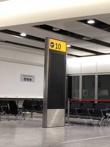 Heathrow Terminal 4 gate lounge, empty in the small hours during the overnight installation.
