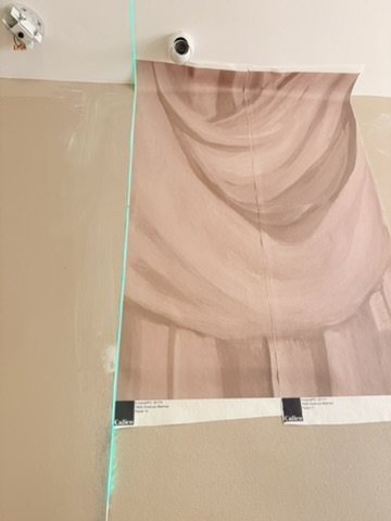 Overture panels aligned at the top of the wall during installation.