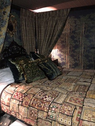 Four-poster bed and canopy in the finished bedroom.