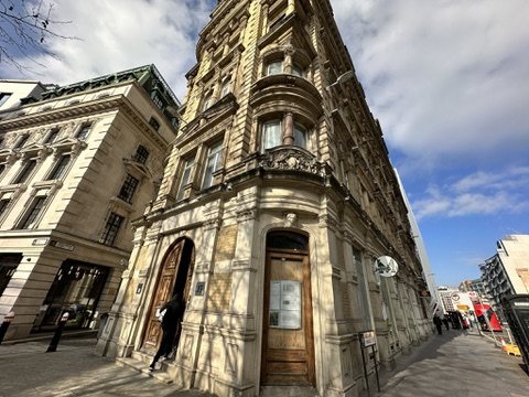 Corner façade of 15 Old Bailey, the 1874 hotel building in the City of London.