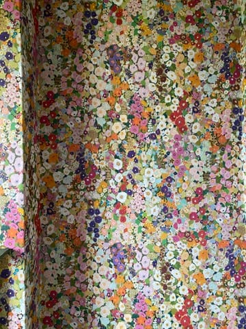 Close view of a hollyhock wallpaper at the Castle of Trematon.